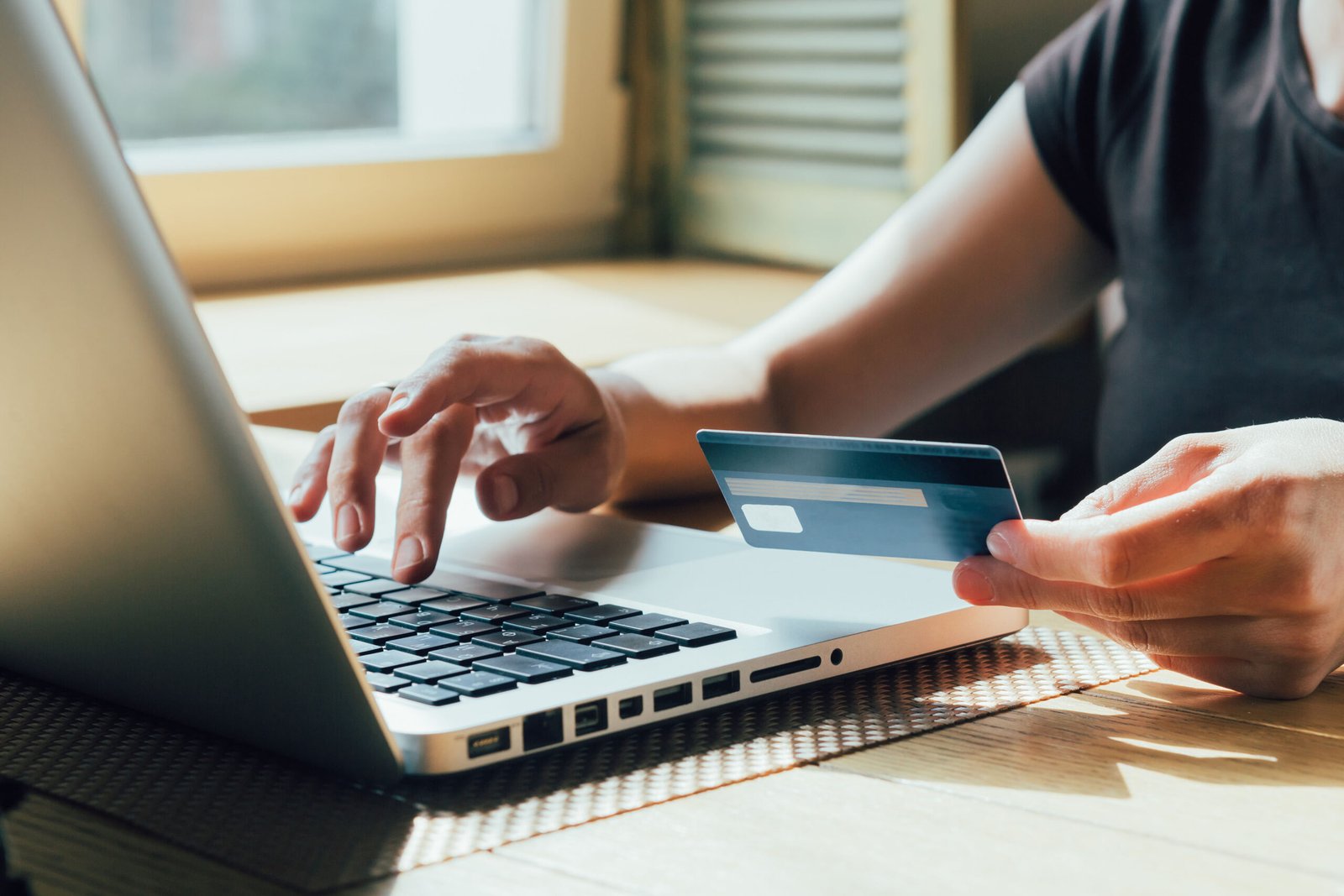 the girl is shopping on the internet